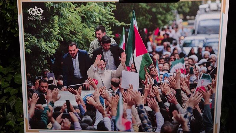 نمایشگاه عکس «رئیسجمهور شهید» در قم برپا شد