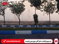 دود غلیظ در آسمان پاکدشت ناشی از آتش در زمین‌های زراعی است