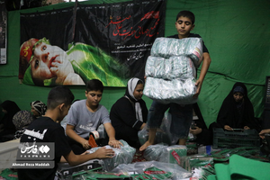 آماده کردن لباس شیرخوارگان حسینی در شیراز