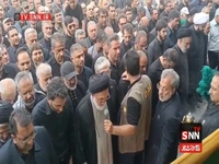 اقامه نماز بر پیکر شهید دکتر طهرانچی و همسرش