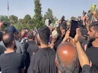 پیکر سردار حاجی‌زاده وارد قطعه مدافعان حرم شد