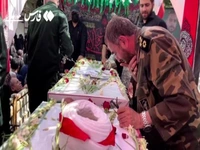 وداع جانسوز سردار باقرزاده با پیکر شهید رشید