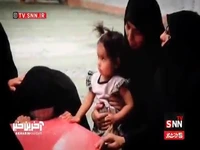 وداع تلخ فرزندان خردسال و همسران شهدا با پیکر شهیدانشان در بیرجند