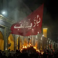 دسته‌های عزاداری نجف با مشعل‌ها و اماکن مقدس در شب عاشورا 