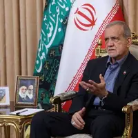 عکس/ مصاحبه رئیس جمهور با عکس رایان قاسمیان نوزاد شهید جنگ اسرائیل