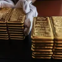 طلای جهانی در سراشیبی ماند