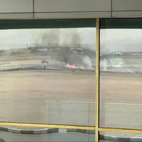 علف‌های خشک و هرز فرودگاه مشهد سوزانده شد