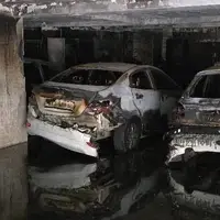 آتش سوزی مجتمع مسکونی در تهران، سه خودرو در آتش سوخت و ۱۴ نفر نجات یافتند