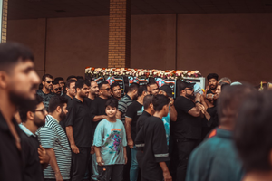 عکس/ تشییع آتش‌نشان فداکار در کنگان