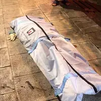 حاوی تصاویر دلخراش؛ کشف جسد مردی پیچیده در فرش