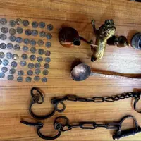 کشف ۸۷ شیء تاریخی از یک منزل در بم