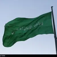 اهتزاز پرچم متبرک به نام حضرت مهدی (عج) بر فراز شهر همدان