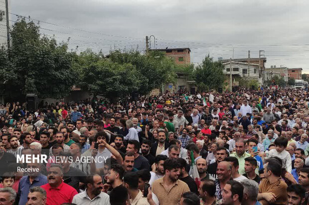 عکس/ استقبال از رحمان عموزاد قهرمان کشتی جهان در بهشهر