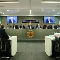 مناقشه ارزی مدنی‌زاده و فرزین