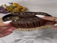 کیک شکلاتی کرمدار طعم شیرین زندگی