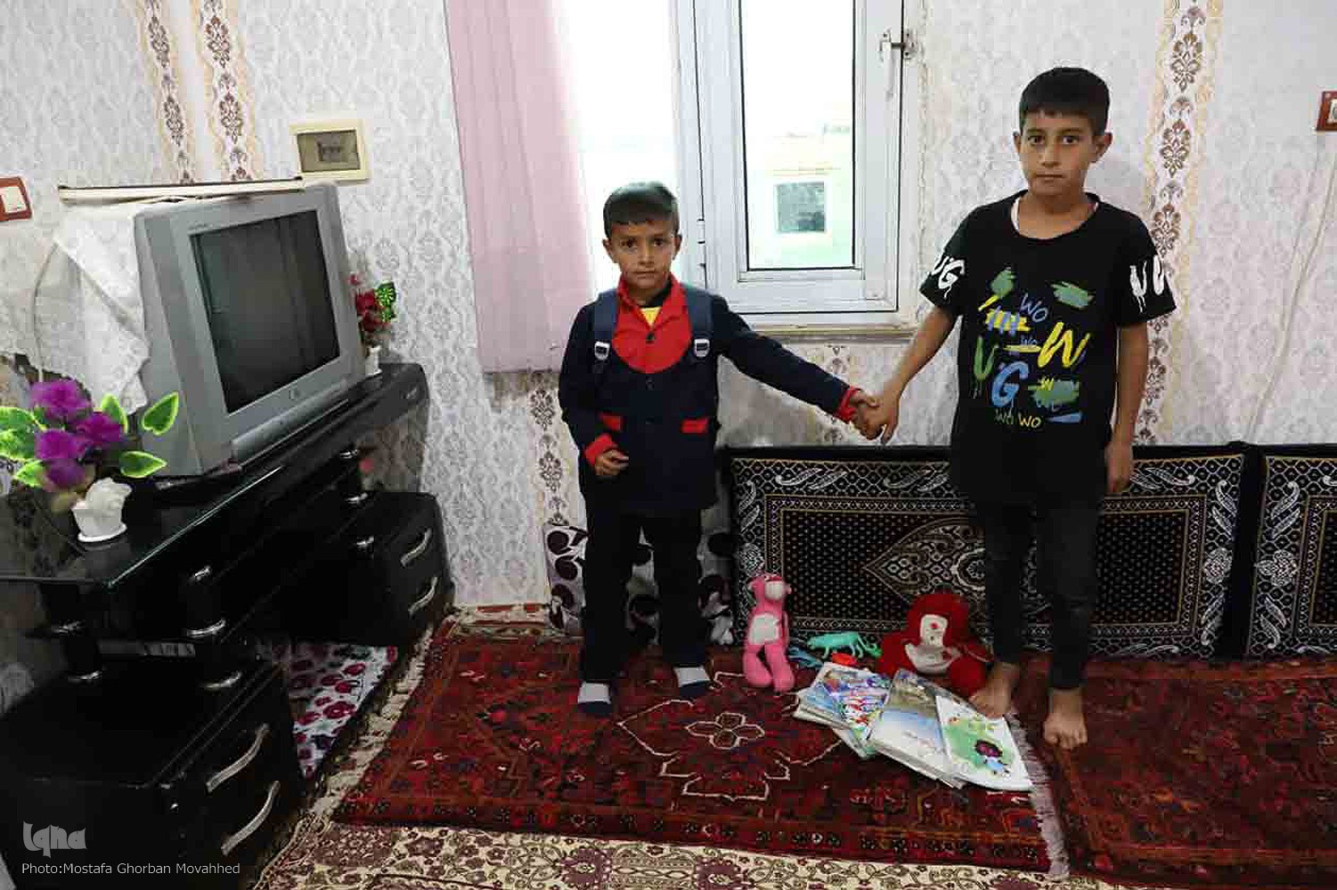 عکس/ تجربه کودکانه از غم و شادی های روزگار 