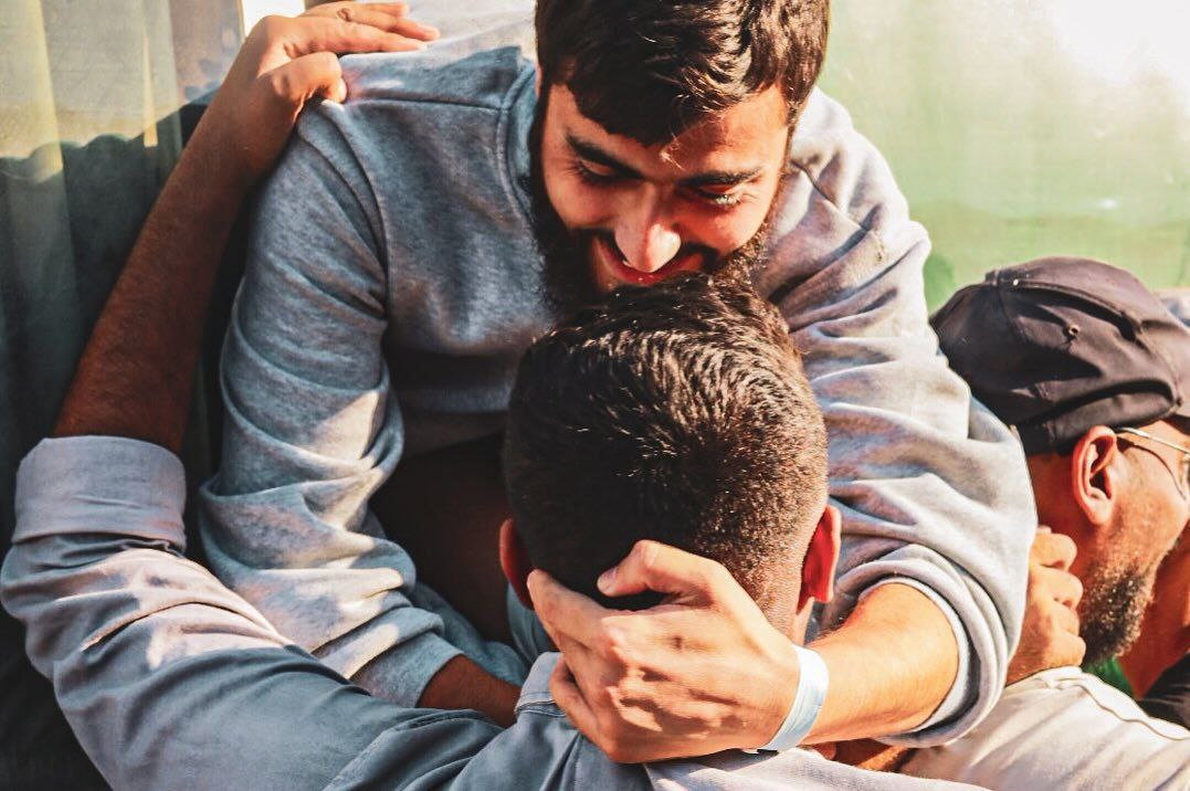 عکس/ لحظه رسیدن اسرای آزاد شده فلسطینی به غزه