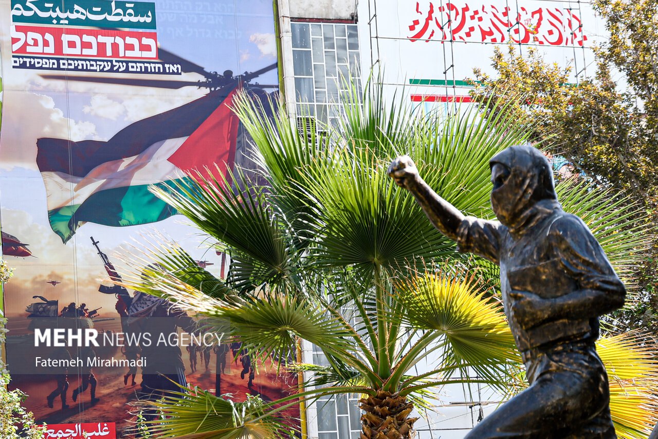 عکس/ رونمایی از طرح جدید دیوارنگاره میدان فلسطین
