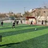 زمین چمن مدرسه فرزانگان در قم به بهره برداری رسید