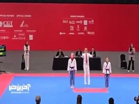 شادی شهریاری پس از کسب مدال طلا و بوسه بر پرچم ایران
