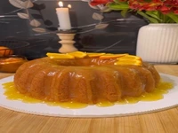 این کیک پرتقال بافت سبک و نرمی داره عطر و طعمش هم بی‌نظیره