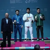 حضور دبیرکل کمیته ملی المپیک در مراسم توزیع مدال وزنه‌برداری مردان