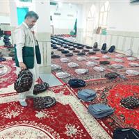 توزیع لوازم‌التحریر بین دانش‌آموزان احسان‌پذیر راسک