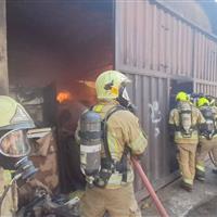 مهار آتش‌سوزی گسترده در سوله بزرگ تولید محتوای فرهنگی در غرب تهران