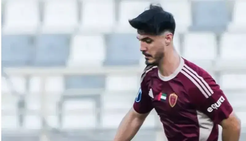 جوان ایرانی روی پوستر الوحده رفت