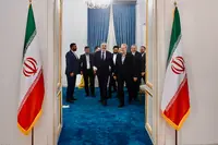 تصاویری از دیدار فیدان و لاریجانی؛ از استقبال تا بدرقه