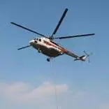 اطفای حریق جنگل‌های توسکستان با تلاش بالگرد هلال احمر