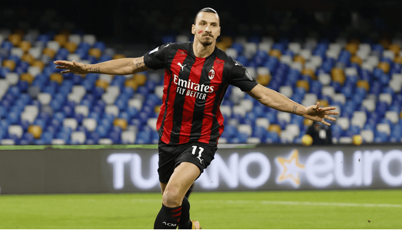 زلاتان مشعل المپیک را حمل میکند