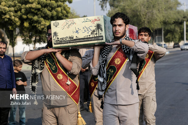 عکس/ تدفین شهید گمنام در پردیس شهید بهشتی بندرعباس