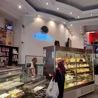 خرید شیرینی نصف شد