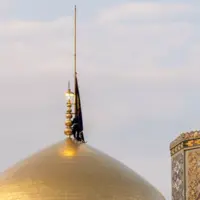 تعویض پرچم حرم امام رضا(ع) در آستانه وفات خضرت زینب (س)