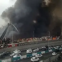 تصاویر از اطفای حریق در بازارچه جنت